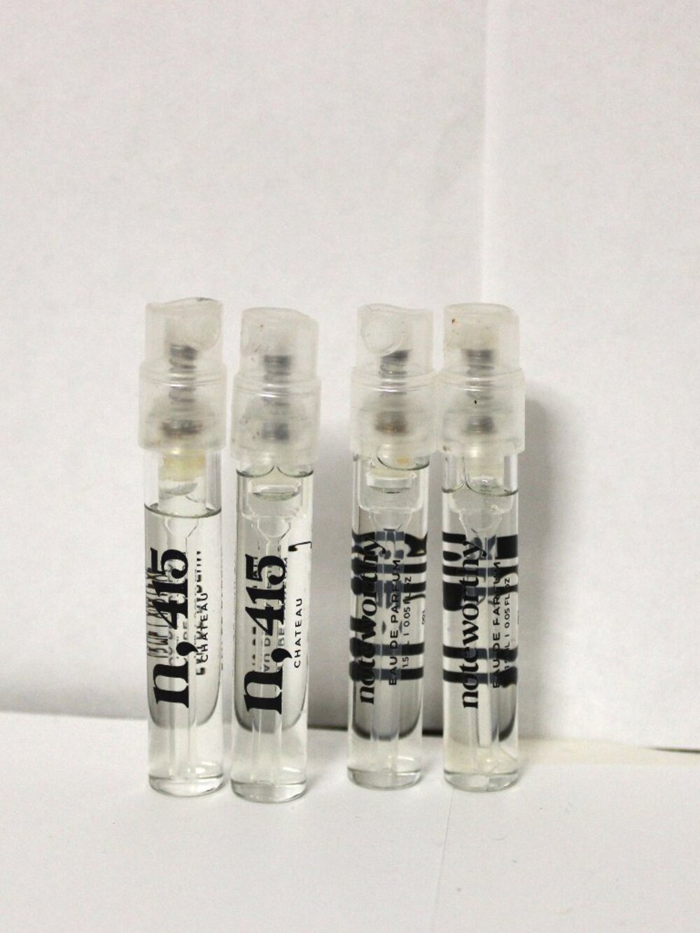 N,45 NOTEWORTHYEAU DE PARFUM VAILS (LOT OF 4)